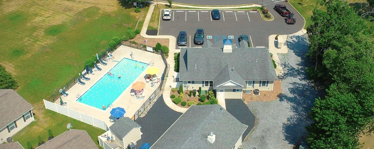 Aerial view of the community pool and clubhouse